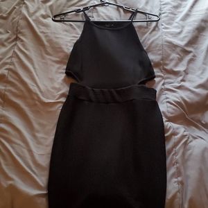 Tight fitting mid thigh spaghetti strap dress